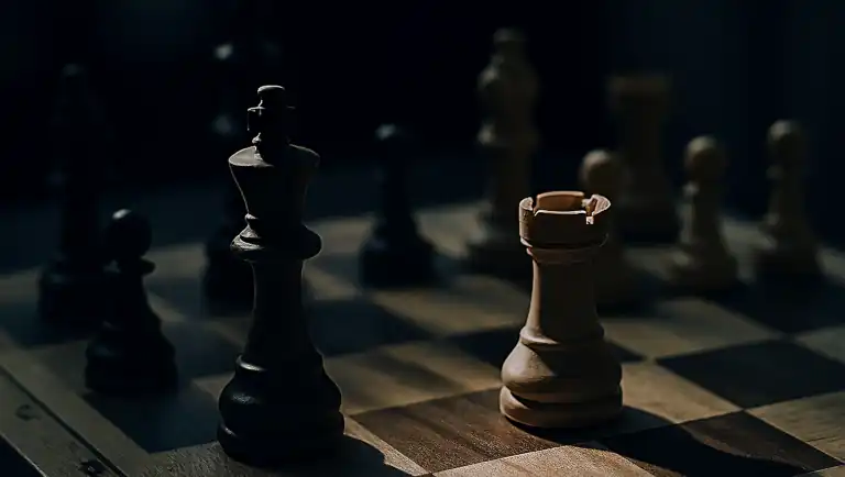 Chessboard mid-game with frozen pieces symbolizing strategic stillness and calibrated paralysis.